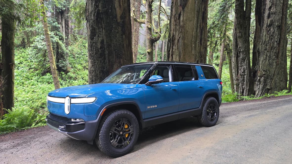 Drive Elevated Rivian R1S on a forest road
